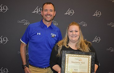  Marianne Holt from SMS receives a Fantastic 49 Award.